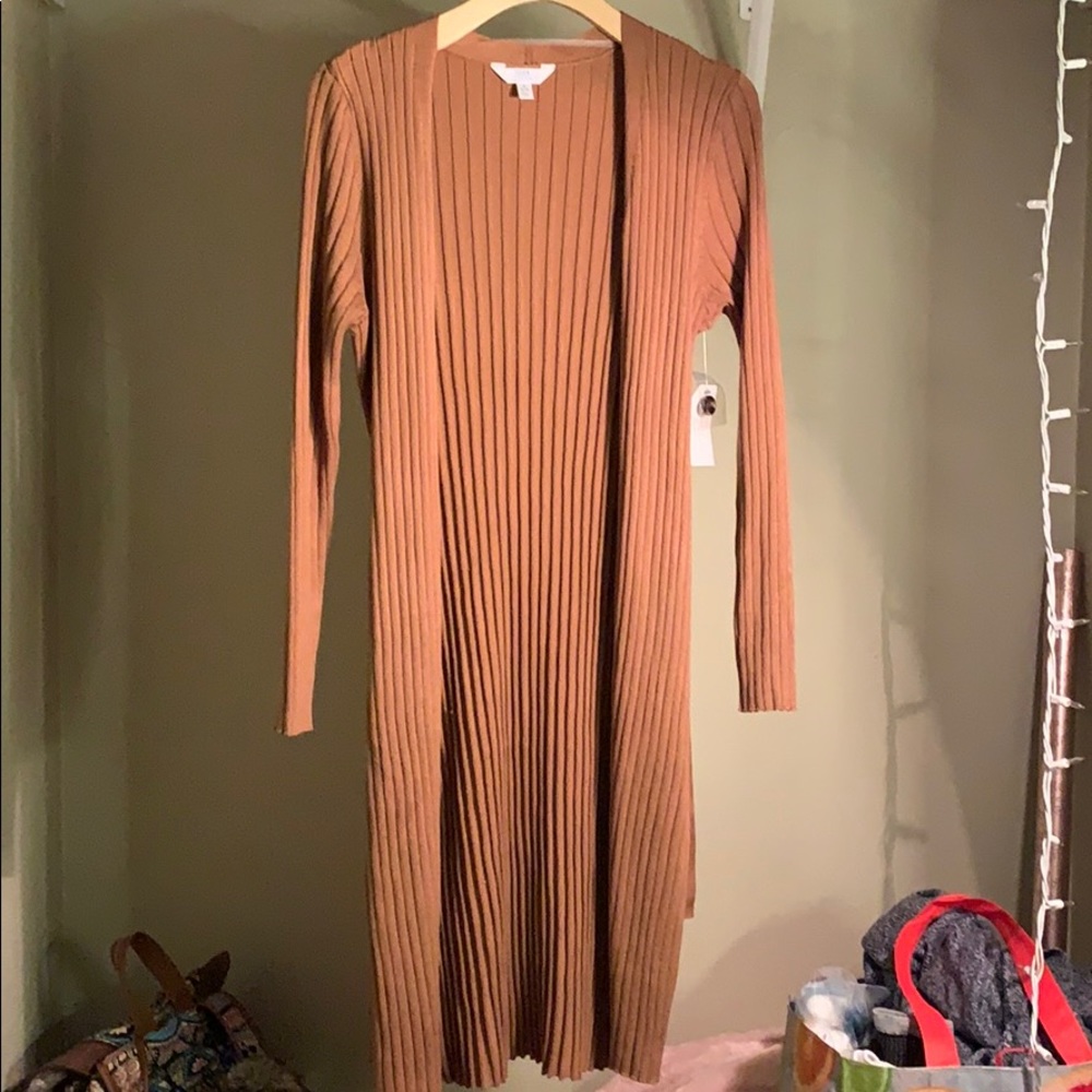 A cardigan never worn!